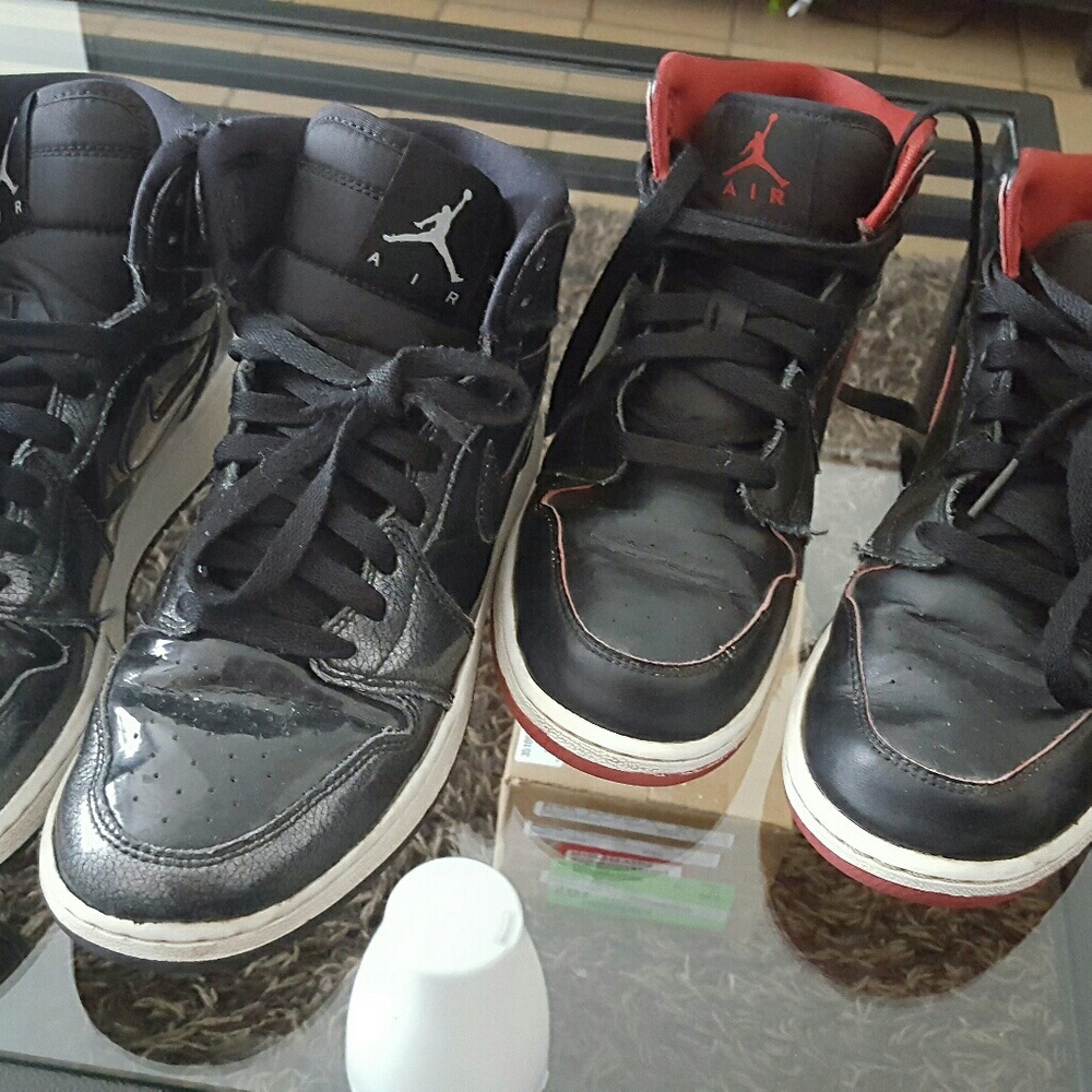 2 pairs of boys Michael Jordan basketball shoes